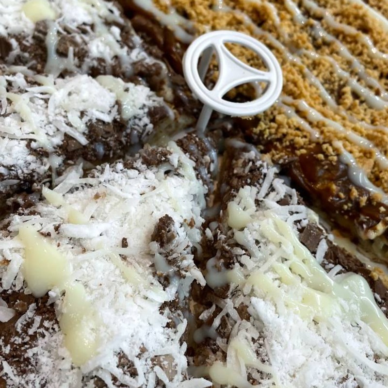 Detalhe de pizza Brasa Crioula